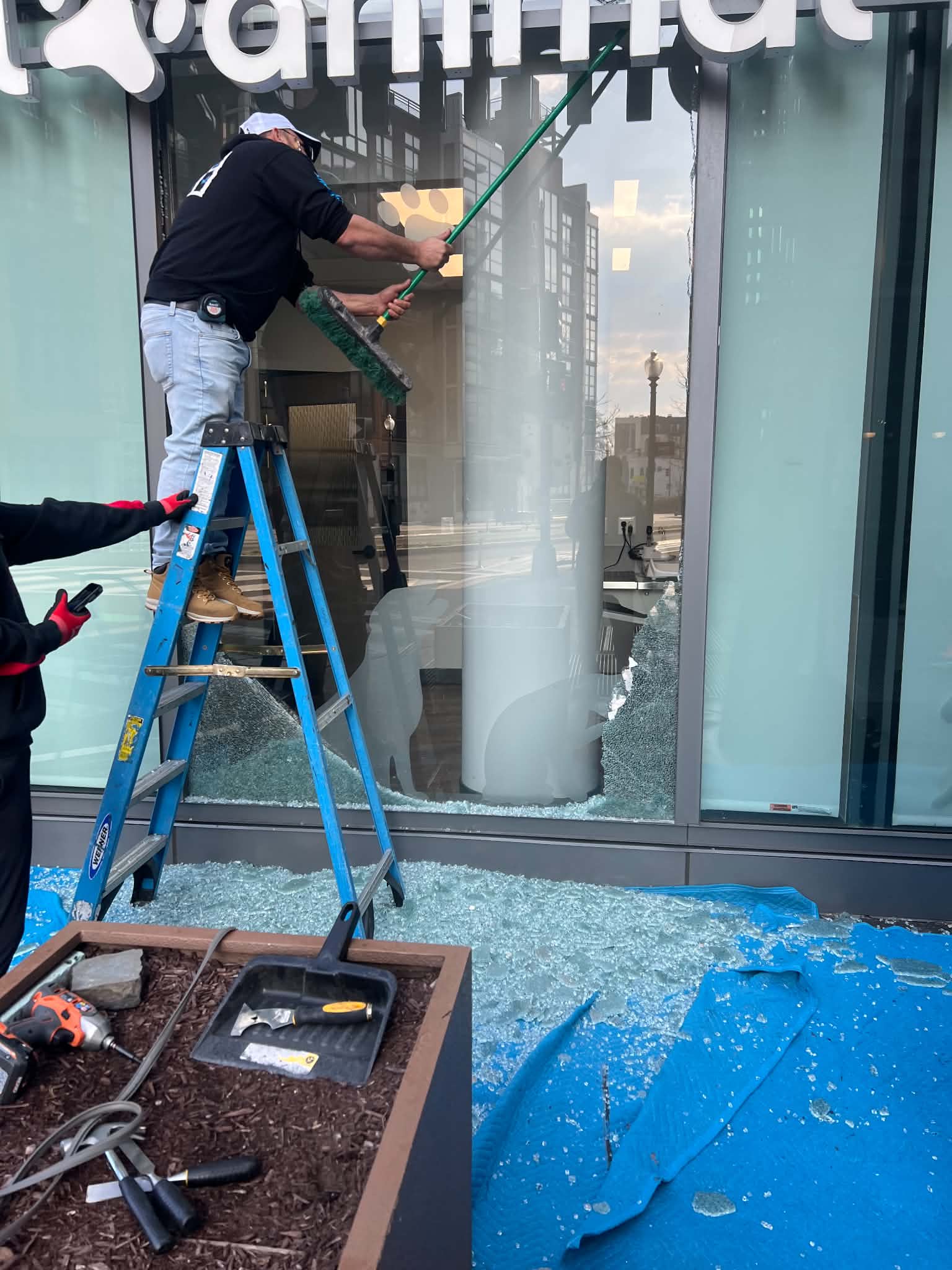 Before storefront glass repair